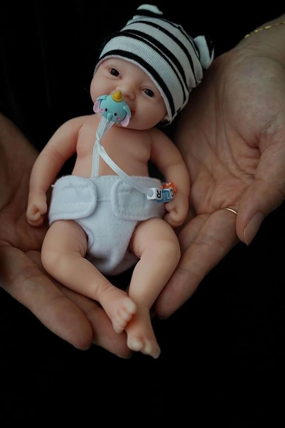 Reborn Baby Doll ,7 Inch Silicone Doll Girl ,Mini Realistic Newborn Baby Dolls Silicone Full Body Stress Relief with Feeding Accessories