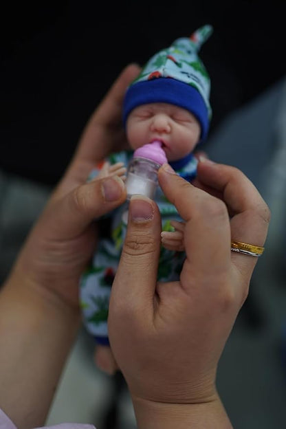 7 Inch Mini Silicone Baby, Reborn Baby Dolls Silicone Full Body Boy Eric, Realistic Newborn Baby Doll Real Life Miniature Baby Doll with Feeding Accessories