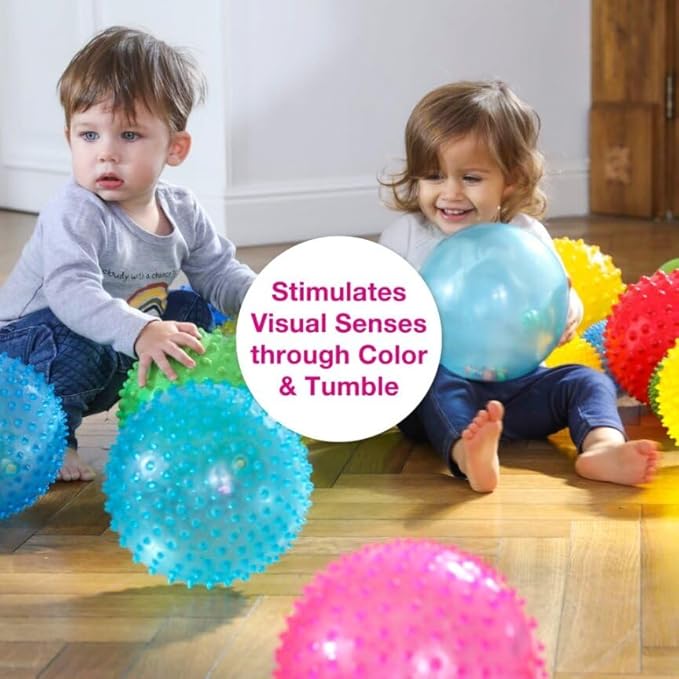 Edushape Rainbow Soft Sensory Ball for Baby and Toddlers - 7" Multi-Color Mini Noisemaker with Colorful Beads Inside - Fine Motor Skills Development