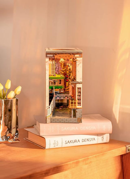 ROBOTIME DIY Book Nook Kit DIY Miniature Dollhouse Booknook Kit 3D Wooden Puzzle with LED Light,Decorative Bookend Bookshelf Insert Decor for Teens and Adults (Sakura Tram)