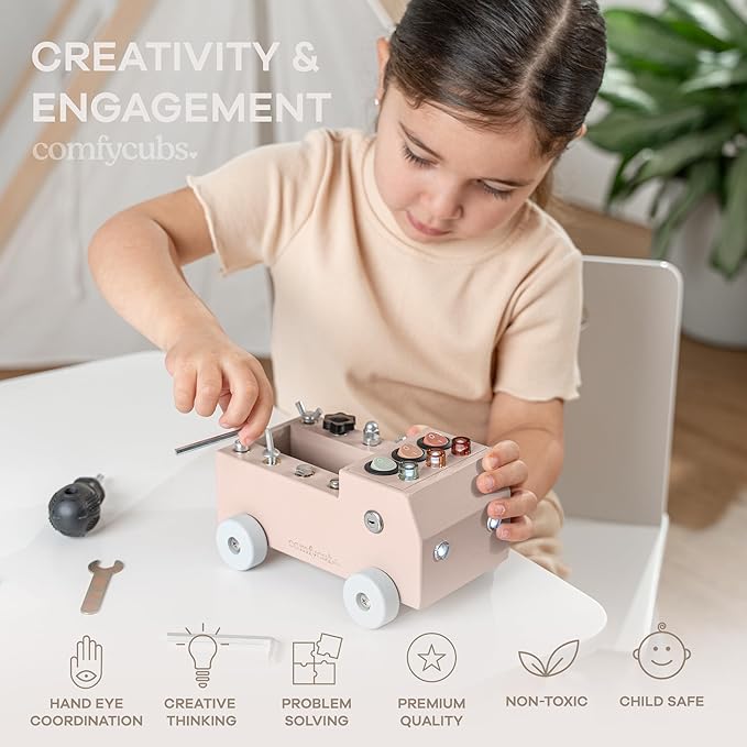 Comfy Cubs Busy Board Toy Truck Set - Fun & Noise-Free, Pine Wood Activity Board for Toddlers with LED Light Switch - Designed in The US, Focused & Engaging Montessori Play for Kids 3+ (Blush)