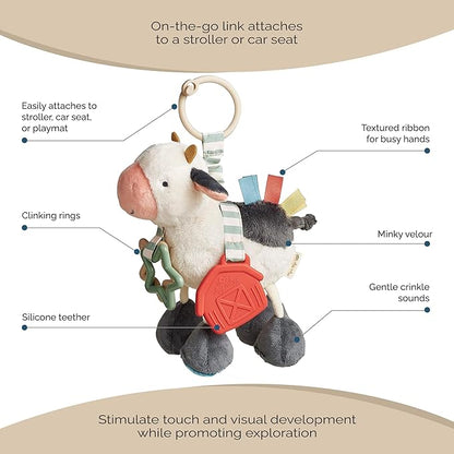 Itzy Ritzy Link & Love Toy for Stroller or Car Seat; Features Textured Ribbons, Crinkle Sounds, Clinking Rings & Silicone Teether; Designed for Ages 0 Months and Up (Cow)